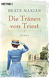 a woman in a blue dress and hat